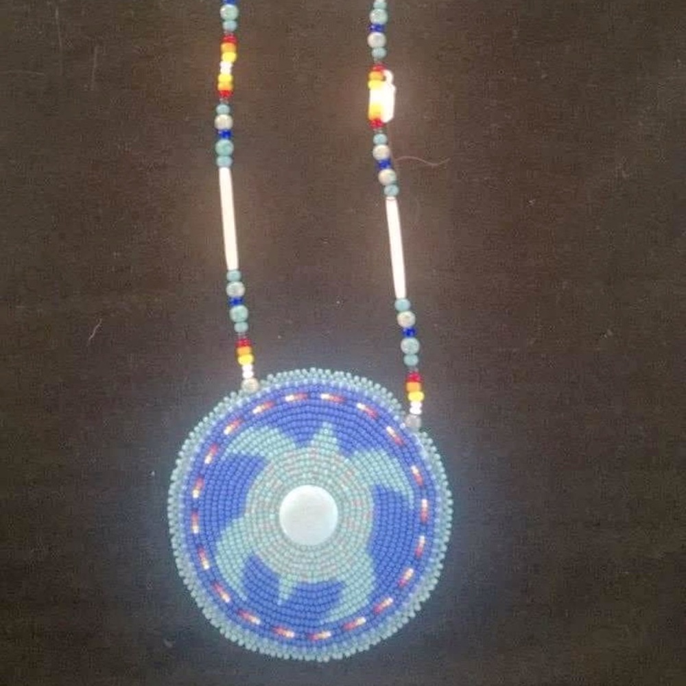 Handmade beadwork Native American traditional turtle medallion